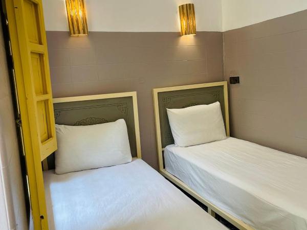 The Madrassa Hostel : photo 3 de la chambre chambre quadruple Économique avec salle de bains commune