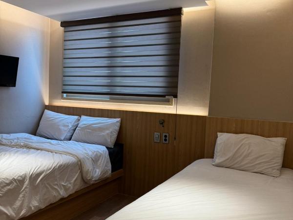 Well Plus Guest House : photo 5 de la chambre chambre triple