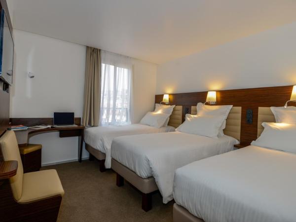 Hôtel & Appartements Monsigny : photo 1 de la chambre chambre triple