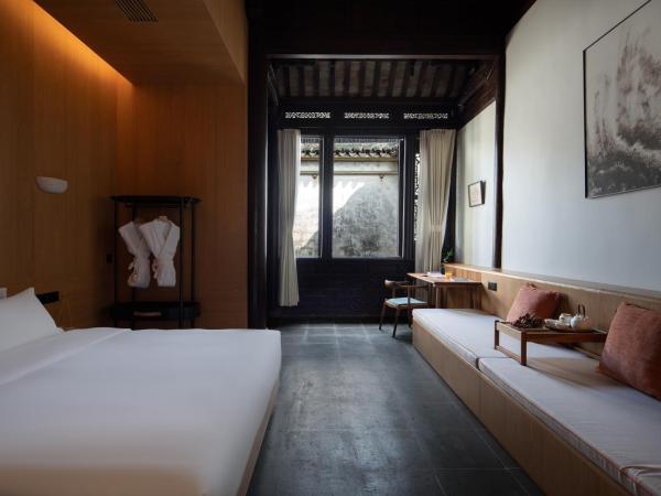 The Linden Centre Suzhou : photo 4 de la chambre chambre lit king-size - vue sur jardin