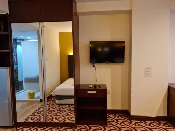 COZY Studio at Ming Garden Residence : photo 5 de la chambre chambre lits jumeaux avec douche 