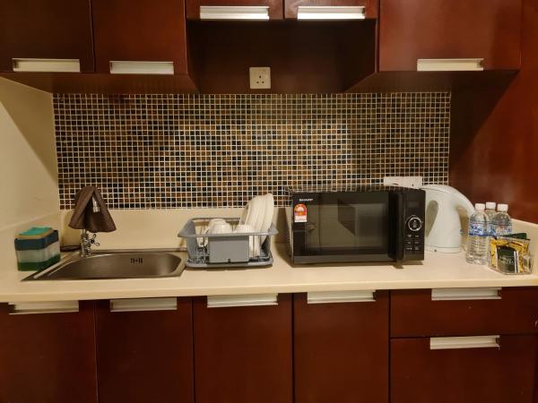 COZY Studio at Ming Garden Residence : photo 9 de la chambre chambre triple confort avec douche