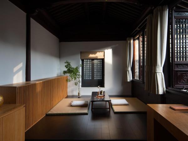 The Linden Centre Suzhou : photo 4 de la chambre garden view king room with a tea break area