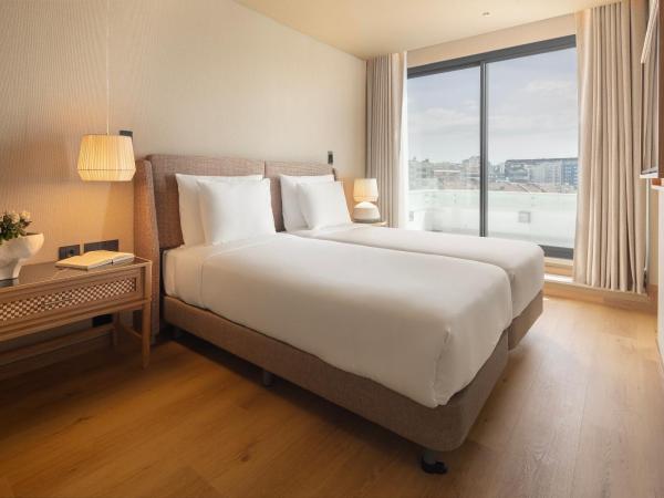 EVOLUTION Valbom : photo 1 de la chambre suite - vue sur ville