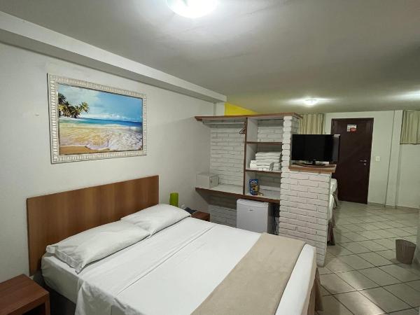 Pousada Laranja - Nova Administração : photo 1 de la chambre chambre familiale standard