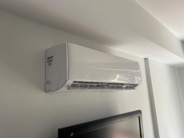 Hostal El Olivo : photo 10 de la chambre chambre triple avec terrasse