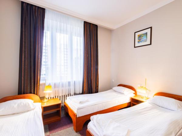 Noclegi Stadion Bed & Breakfast : photo 2 de la chambre standard triple studio with kitchenette