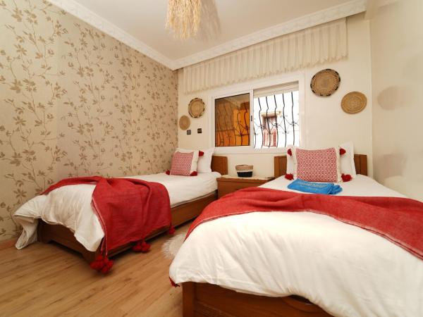 Waves Hunter Surf House : photo 4 de la chambre chambre lits jumeaux Économique