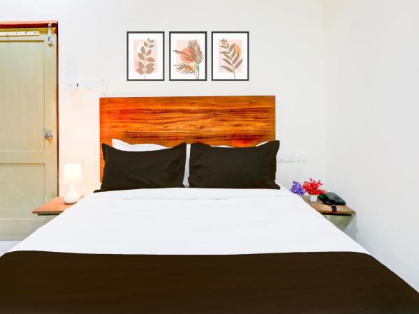 Super Collection O HOTEL SS BLUE INN : photo 9 de la chambre chambre triple classique