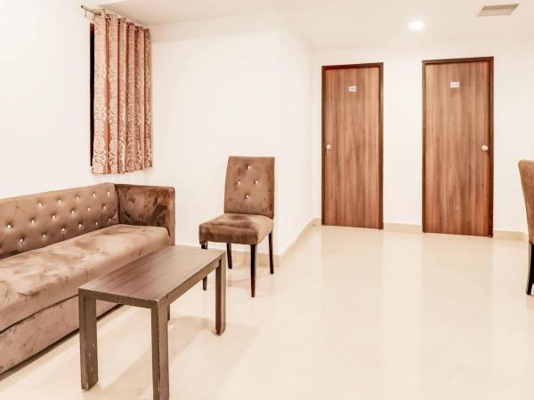 Super Collection O Earth Apart Hotel : photo 2 de la chambre chambre double standard