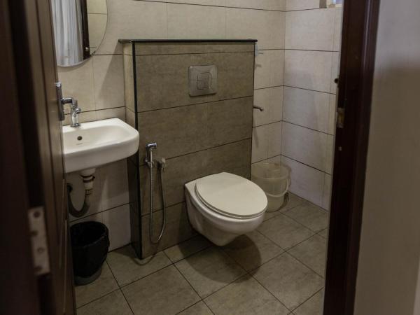 Aryaas Residency Nettoor : photo 2 de la chambre chambre double standard