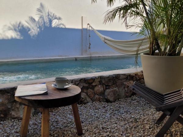 Hotel Boutique KAA : photo 4 de la chambre chambre lit king-size - vue sur piscine