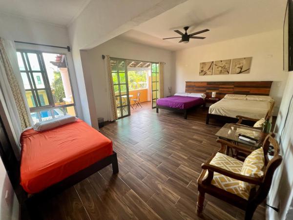 Cancun-Soho : photo 9 de la chambre suite lit queen-size - vue sur piscine