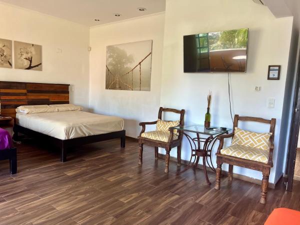 Cancun-Soho : photo 6 de la chambre suite lit queen-size - vue sur piscine