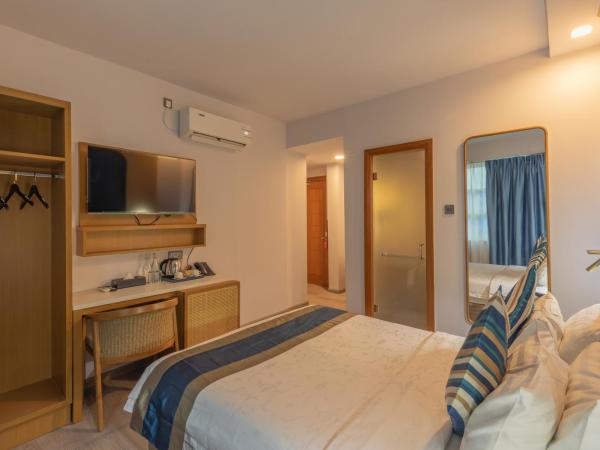 UMET Seaview Hotel with Free Roundtrip Airport Pick up and drop off : photo 7 de la chambre suite supérieure