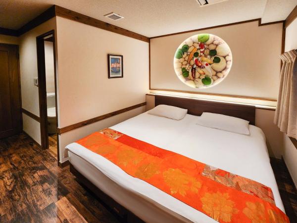 都電屋 TodenHotel : photo 3 de la chambre chambre lits jumeaux avec lit d’appoint - 301