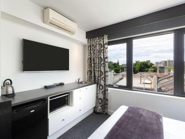 Comfort Hotel East Melbourne : photo 3 de la chambre suite supérieure lit king-size