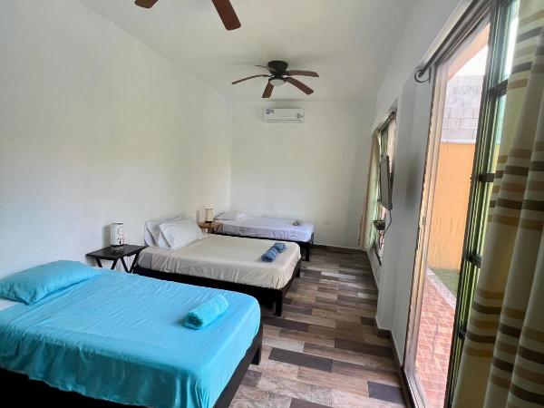 Cancun-Soho : photo 6 de la chambre quadruple room with balcony and view to the garden and pool