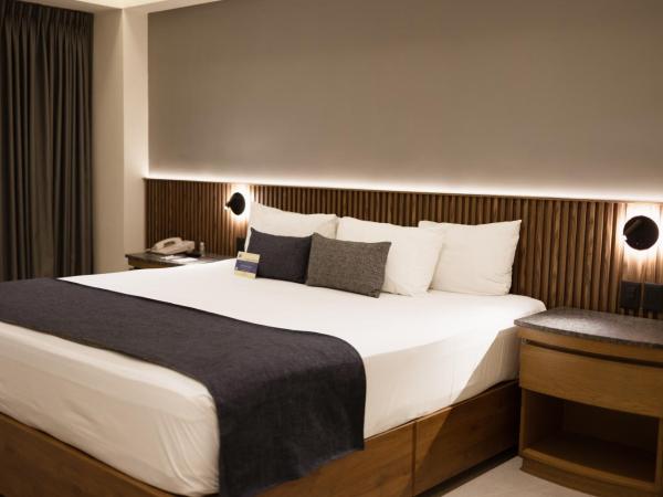 Hotel Guadalajara Plaza Ejecutivo : photo 8 de la chambre chambre supérieure lit queen-size