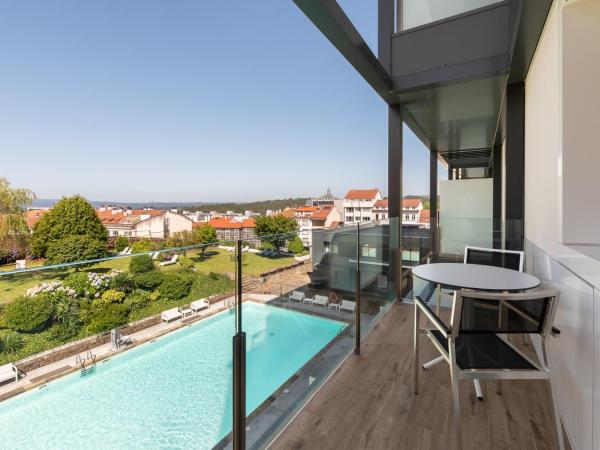 Exe Peregrino : photo 4 de la chambre chambre double ou lits jumeaux deluxe avec balcon