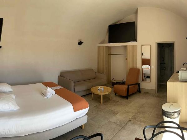 Bastide Saint Jérôme : photo 5 de la chambre chambre quadruple - vue sur jardin