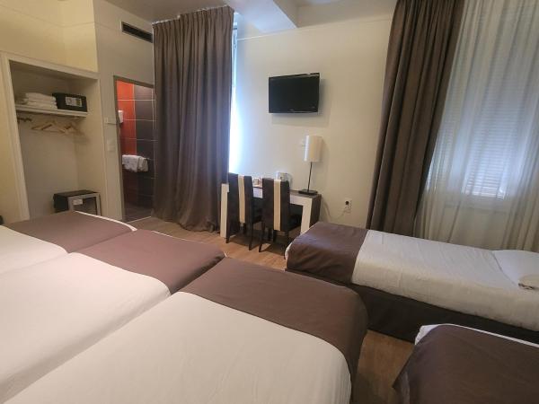 HOTEL DES PRINCES - HOTEL KYRIAD ORANGE Centre Ville -- 3 Etoiles -- Provence Alpes Côte d'Azur - France - A7-A9 : photo 1 de la chambre chambre familiale confort