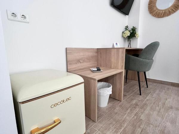 Hotel Romerito : photo 5 de la chambre chambre lits jumeaux pour personnes à mobilité réduite