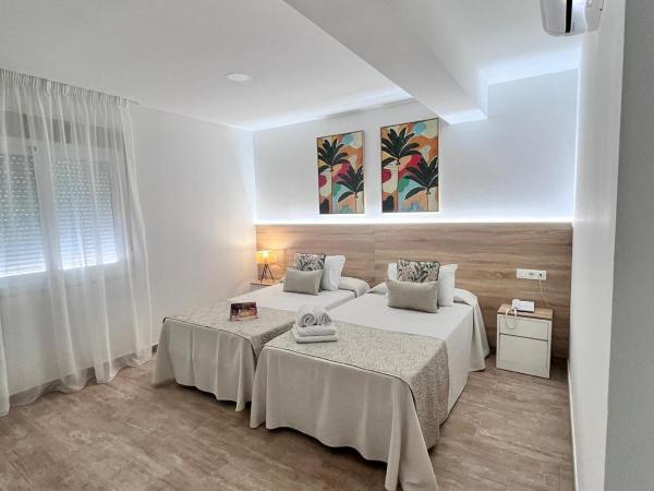 Hotel Romerito : photo 1 de la chambre chambre lits jumeaux pour personnes à mobilité réduite