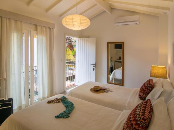 La Chimère Buzios Essence : photo 2 de la chambre chambre double ou lits jumeaux supérieure