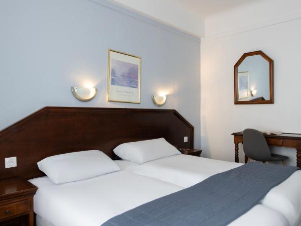 Hôtel Ambassadeur : photo 3 de la chambre chambre lits jumeaux