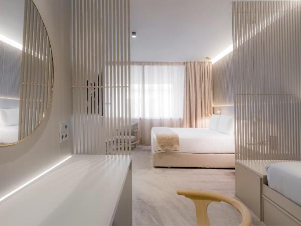 Carlemany Girona : photo 3 de la chambre chambre familiale (2 adultes + 2 enfants)