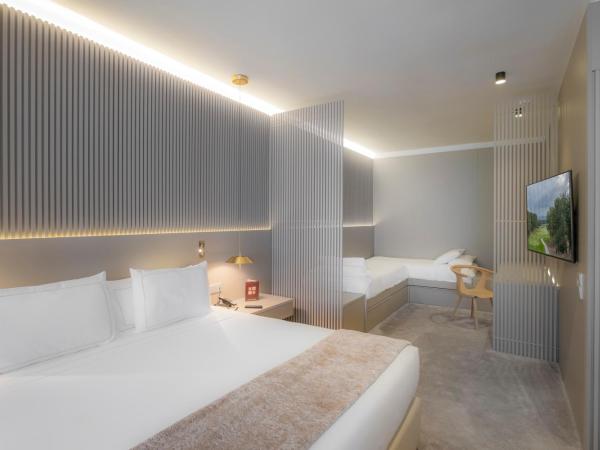 Carlemany Girona : photo 1 de la chambre chambre familiale (2 adultes + 2 enfants)