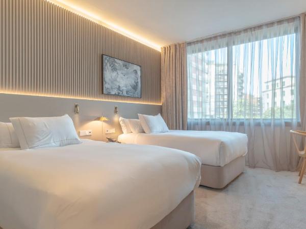 Carlemany Girona : photo 1 de la chambre chambre lits jumeaux supérieure