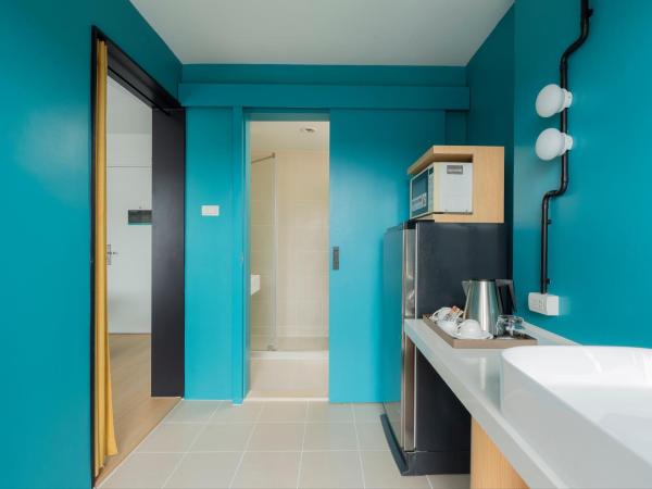 The Grass Serviced Suites : photo 6 de la chambre chambre lit king-size deluxe