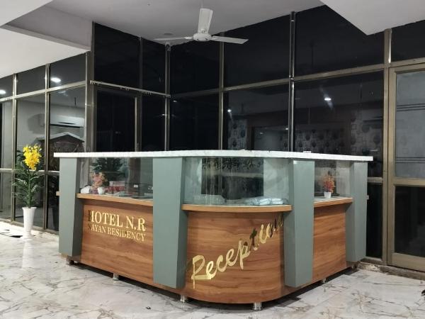 hotel nr nayan residency : photo 2 de la chambre chambre double avec salle de bains privative