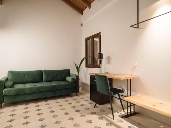 La Moderna Suites : photo 9 de la chambre suite - vue sur jardin