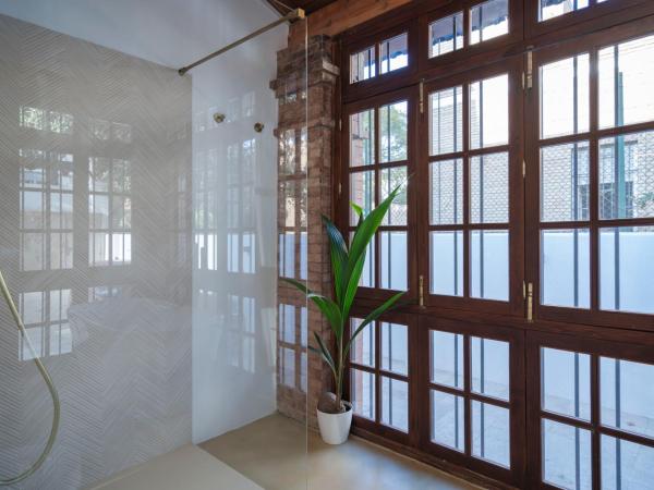 La Moderna Suites : photo 6 de la chambre suite lit king-size - vue sur piscine