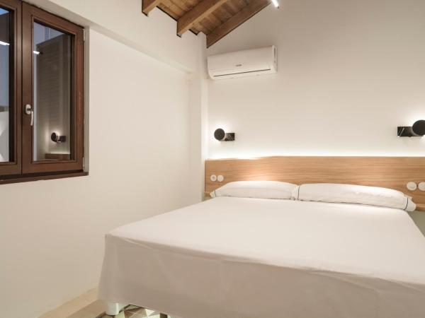 La Moderna Suites : photo 8 de la chambre bungalow - vue sur jardin