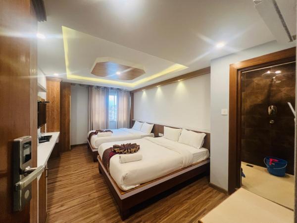 Hotel Nirakar : photo 8 de la chambre chambre quadruple deluxe