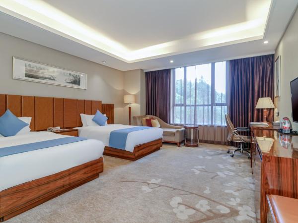 GuangZhou TongYu International Hotel : photo 2 de la chambre chambre lits jumeaux deluxe