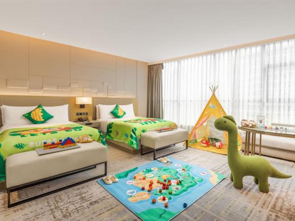 Chengdu Marriott Hotel Financial Centre : photo 8 de la chambre family room with two twin beds and twin towers view