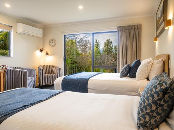 Wanaka Top 10 Holiday Park : photo 1 de la chambre studio en motel avec cuisine