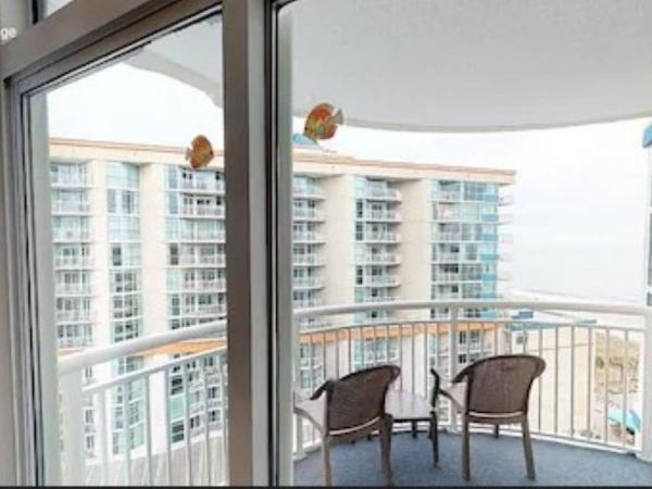 Dunes Village : photo 1 de la chambre suite lit queen-size bord de mer avec vue partielle