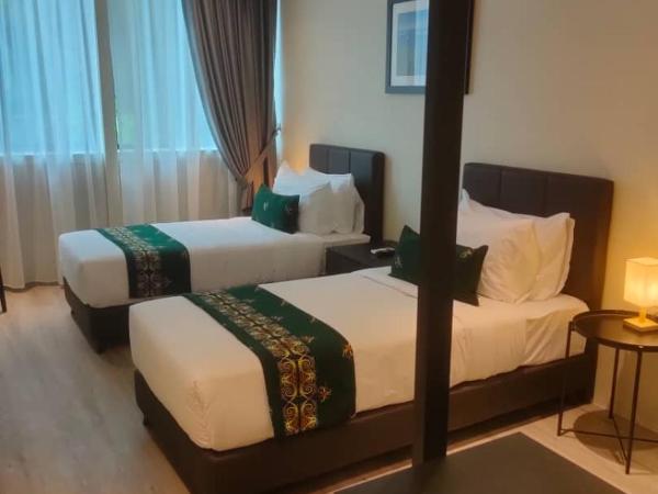 Telang Usan Hotel Kuching : photo 3 de la chambre chambre lits jumeaux deluxe