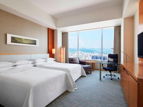 Sheraton Grand Hiroshima Hotel : photo 4 de la chambre chambre deluxe avec 2 lits doubles - vue sur ville