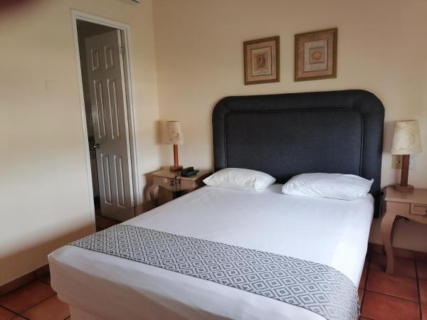 Suites Las Palmas : photo 1 de la chambre chambre lit king-size