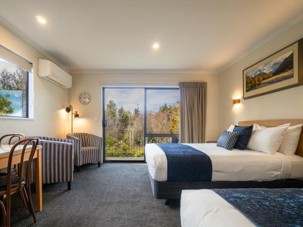 Wanaka Top 10 Holiday Park : photo 2 de la chambre studio en motel avec cuisine