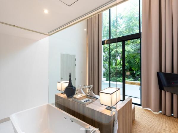 K Maison Lanna Boutique Hotel-SHA Plus Certified : photo 9 de la chambre hébergement dupex lanna