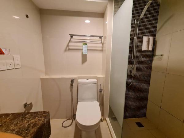 COZY Studio at Ming Garden Residence : photo 4 de la chambre studio lit king-size