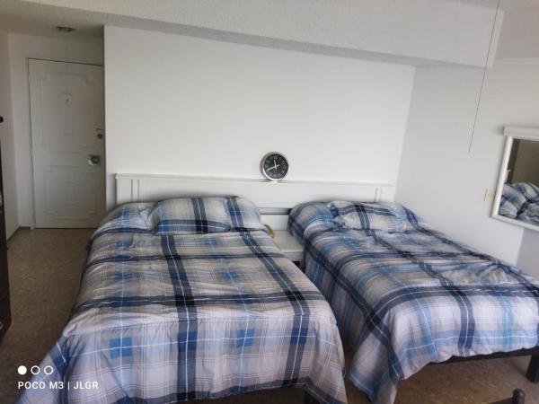 Playa Dorada Condominio Torres Gemelas : photo 9 de la chambre chambre lits jumeaux avec balcon